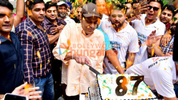 Photos: Dharmendra celebrates his birthday by cutting cake with fans and media