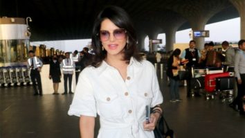 Sunny Leone flashes her pretty smile for paps at the airport