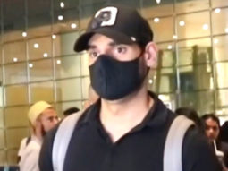 Ahan Shetty gets clicked at the airport in a simple black tshirt and cap