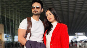 Amrita Rao and RJ Anmol pose for paps at the airport