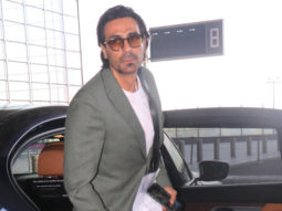 Arjun Rampal gets clicked at the airport in a green suit
