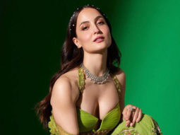Elli AvrRam hypnotizes us with her beauty in a green traditional outfit