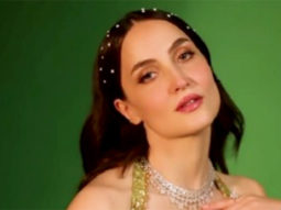 Elli AvrRam twirls around in a gorgeous green lehenga