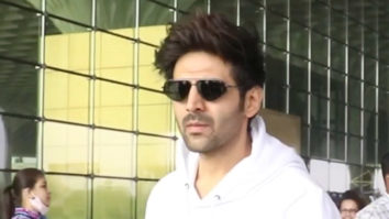 Kartik Aaryan poses for paps in a white hoodie at the airport