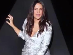 Neha Dhupia looks gorgeous in high slit wrap dress