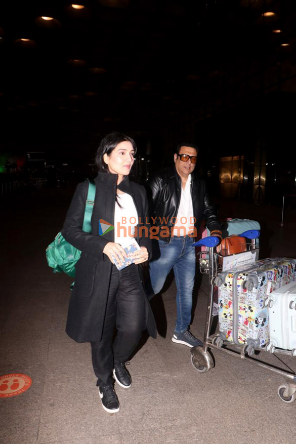 photos govinda and tina ahuja snapped at the airport 2