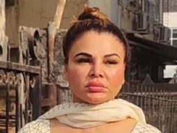 Rakhi Sawant gets clicked in white salwar paired with golden handbag