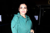 Raveena Tandon gets clicked posing for paps in a green outfit