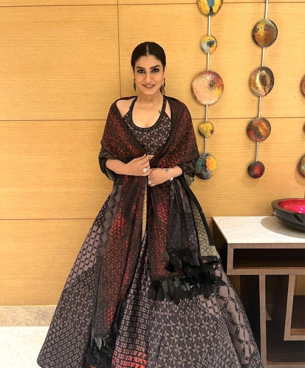 Raveena Tandon in a beautiful black and red lehenga by Manish Malhotra embodies ethnic fashion at its finest