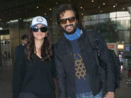 Riteish Deshmukh poses with Mrunal Thakur as they get clicked together at the airport