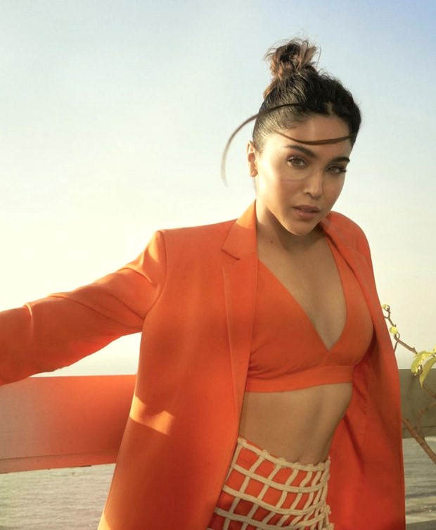 Sharvari Wagh adds her own quirky spin to the power dressing for Elle graduates 2023 with a perforated skirt, an orange co-ord set, and crocs
