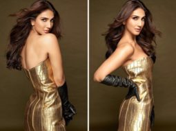 Vaani Kapoor in a gold crocodile mini dress and black gloves is getting us in the weekend party mood
