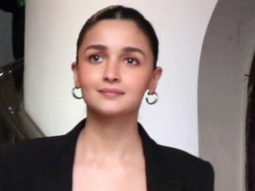Alia Bhatt poses with a little kid flaunting her merch