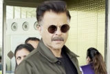 Anil Kapoor looks dashing as he poses for paps at the airport