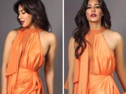 Chitrangda Singh is pumped for the weekend in an orange backless gown featuring high slit