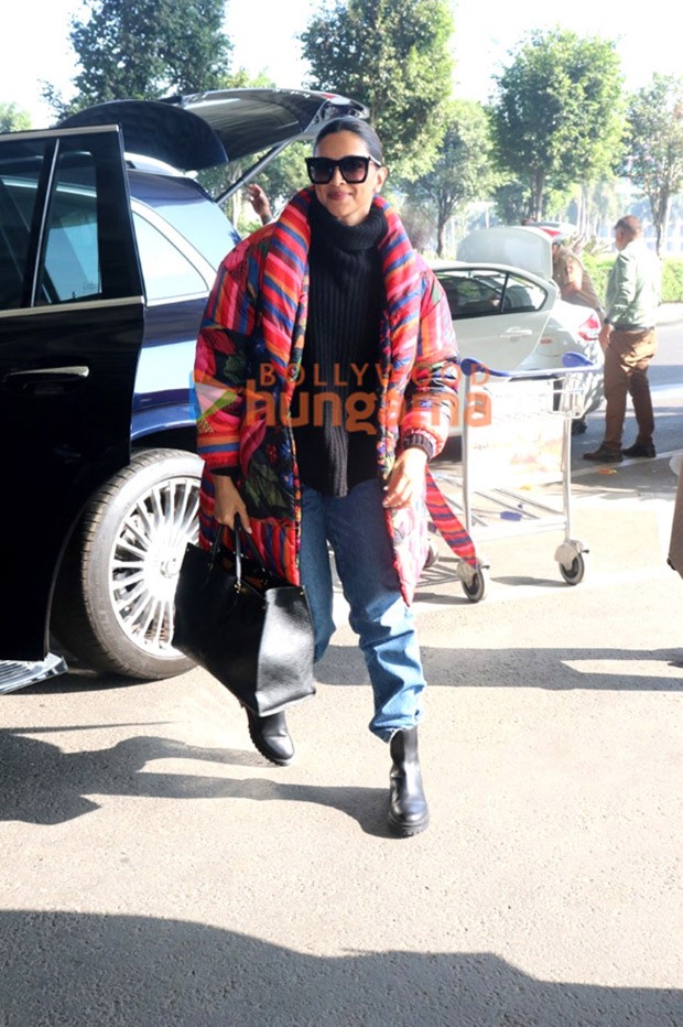 Deepika Padukone bundles up in a colourful puffer jacket as she flies to the second schedule of her movie Fighter