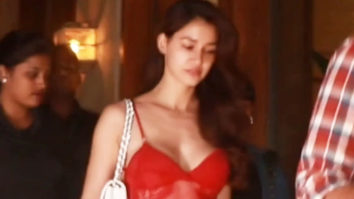 Disha Patani looks crackling dressed in a sexy red top with denims