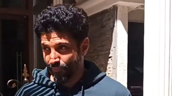 Farhan Akhtar waves at paps sporting a casual look