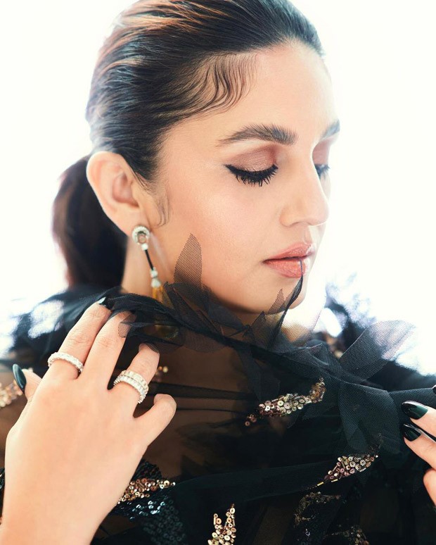 Huma Qureshi’s black shimmery saree by Abu Jani Sandeep Khosla is sure to be a hit at the next cocktail party you attend