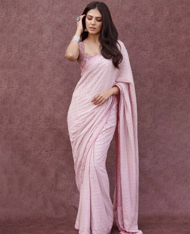 Malavika Mohanan, through her pastel pink saree is making sure we're looking forward to spring