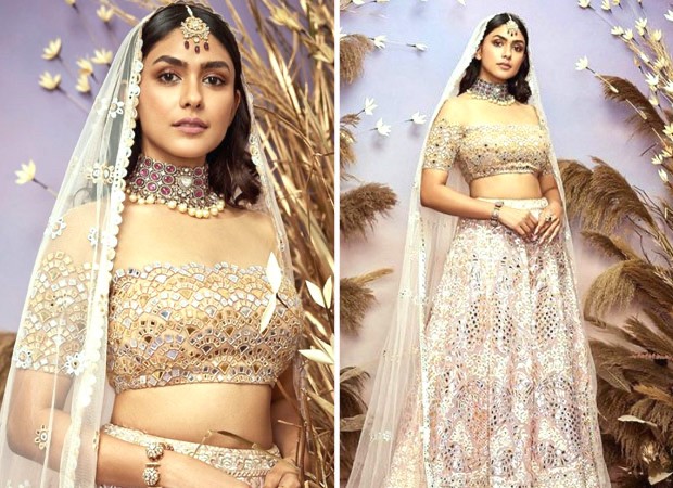 Mrunal Thakur looked like a princess as she walked the runway in an exquisite lehenga with mirror work for the Abu Jani Sandeep Khosla Fashion Show : Bollywood News