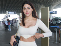 Nikki Tamboli gets clicked at the airport dressed in white outfit