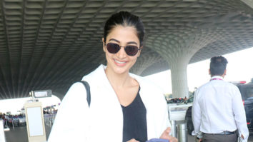Pooja Hegde poses for paps as she gets clicked at the airport