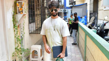 Shahid Kapoor poses for paps in an all white casual look