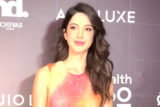Shanaya Kapoor poses for paps in a multicolored glittery outfit