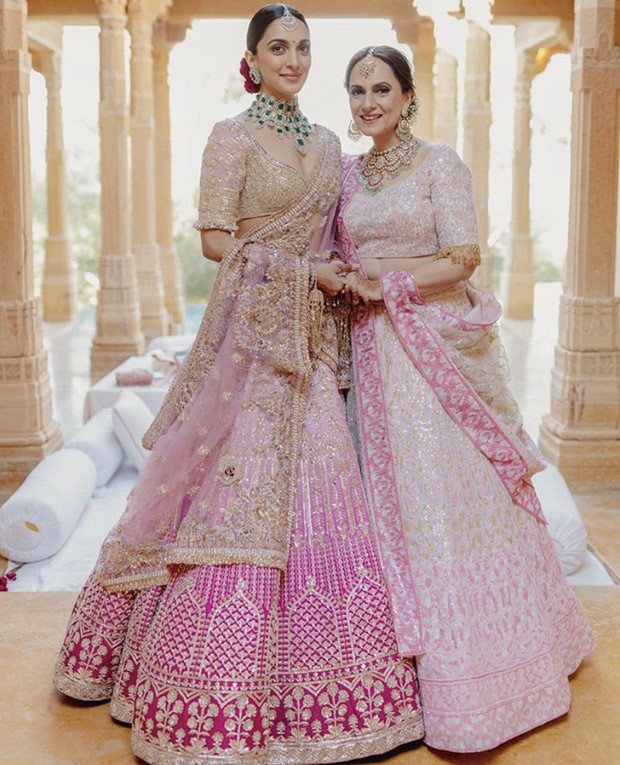 Unseen photos show Kiara Advani twinning with her mother as she walked down the aisle with her parents while wearing a pink lehenga 