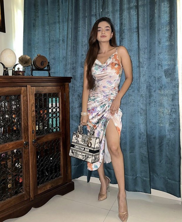 We are already in the mood for a party thanks to Anushka Sen's illusion floral cowl neck dress with thigh high slit 