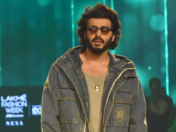 Fans gather around Arjun Kapoor for a selfie post the ramp walk event