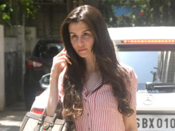 Giorgia Andriani poses for paps in a striped outfit