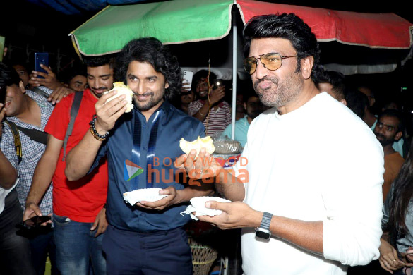 Photos: Nani and Sharad Kelkar enjoy eating vada pav during Dasara promotions