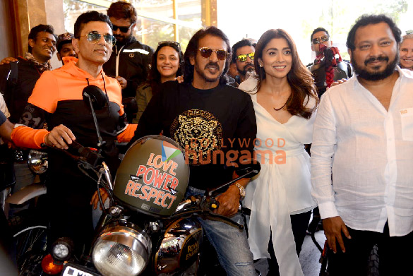 Photos: Producer Anand Pandit and Kabzaa stars Shriya Saran and Upendra ride bikes on Mumbai streets
