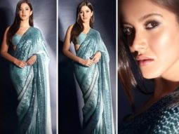 Shanaya Kapoor accentuates her statuesque form in a blue shimmery sari by Manish Malhotra worth Rs.2.25 Lakh