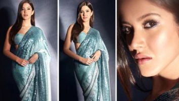Shanaya Kapoor accentuates her statuesque form in a blue shimmery sari by Manish Malhotra worth Rs.2.25 Lakh