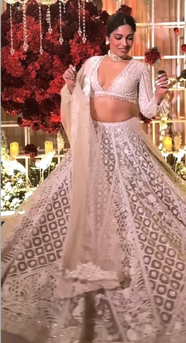 Bhumi Pednekar is twirling her way into our hearts while donning an ivory lehenga set