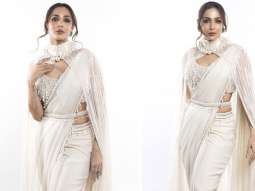 Malaika Arora adds a contemporary twist to her ethnic style quotient with a stunning cape saree embellished with pearls