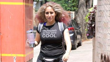 Neha Bhasin waves at paps as she heads towards her gym