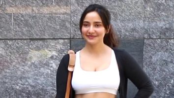 Neha Sharma flaunts her toned midriff as she poses outside her gym
