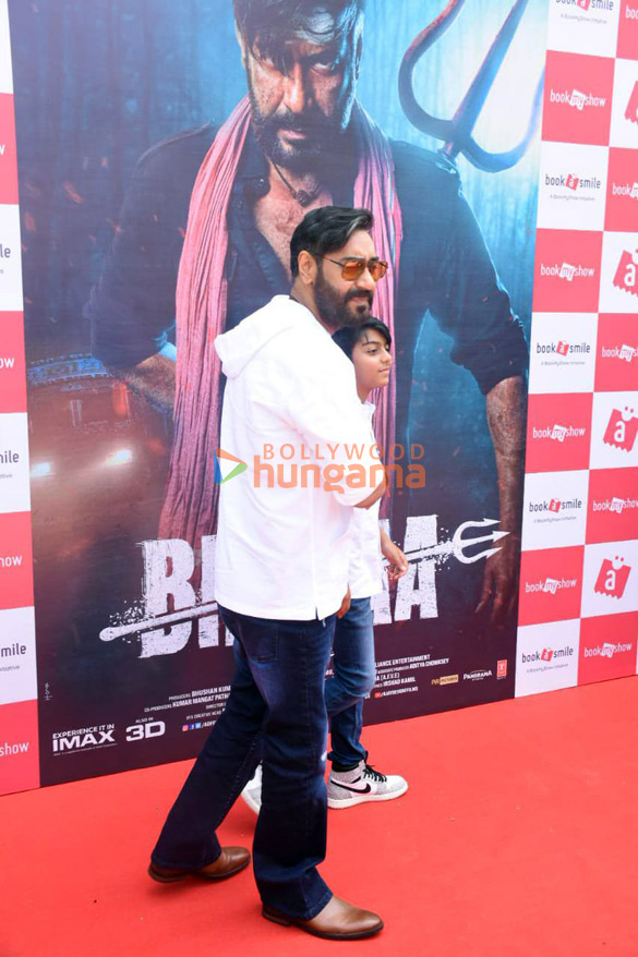 photos ajay devgn and snapped with his son at a screening of bholaa 4