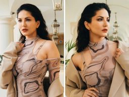 Cannes 2023: Sunny Leone mesmerizes in a sheer brown cut-out midi dress, accompanied by a chic beige overcoat