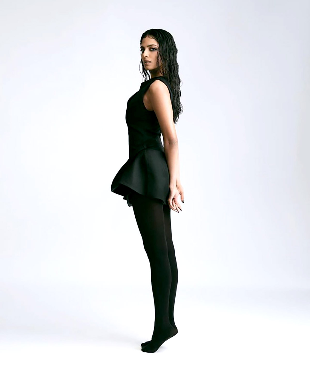 Malavika Mohanan takes centre stage in the iconic Little Black Dress by HMX Mugler, defining sophistication with every stride