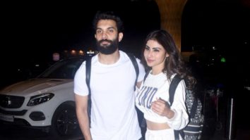 Mouni Roy and husband Suraj Nambiar pose for paps at the airport