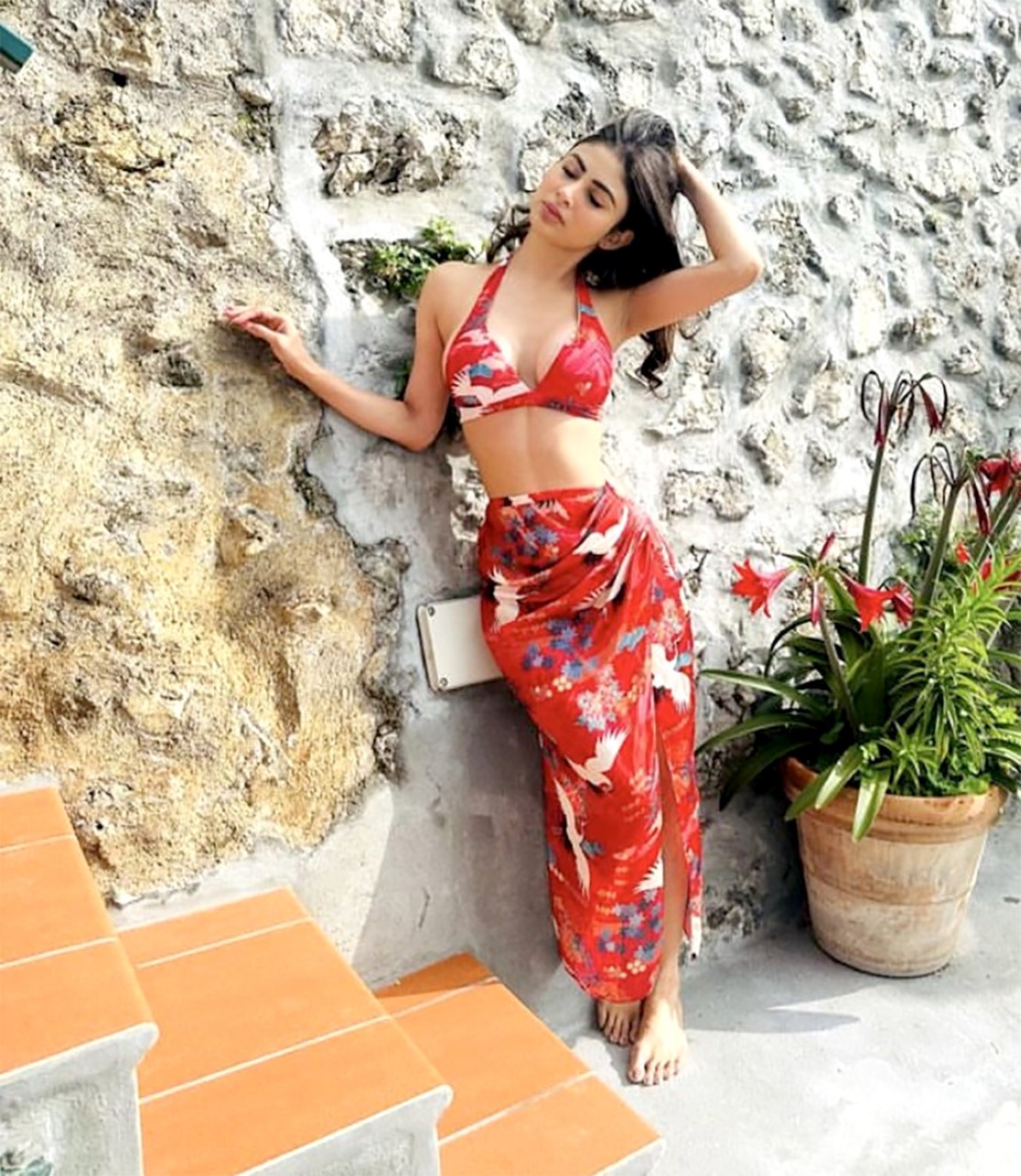 Mouni Roy blooms in her mesmerizing red sarong and bikini, adding a touch of paradise to her vacation style Mouni Roy blooms in her mesmerizing red sarong and bikini, adding a touch of paradise to her vacation style