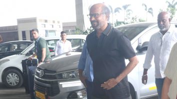 Rajnikanth greets paps with a smile at the airport