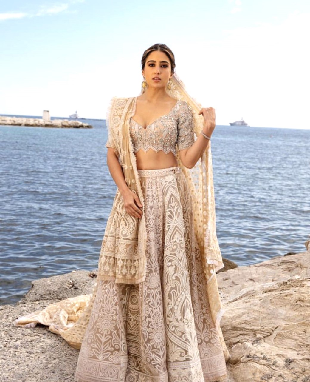 Sara Ali Khan is a regal vision in beige embellished lehenga by Abu Jani-Sandeep Khosla at her Cannes 2023 debut