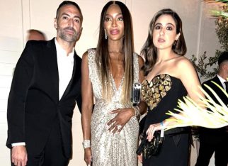 Sara Ali Khan smiles for the camera with Naomi Campbell in a heart-patterned Moschino dress and heart-shaped purse at Cannes 2023