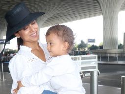 Uska photo mat lo, Shriya Saran requests paps not to click her son
